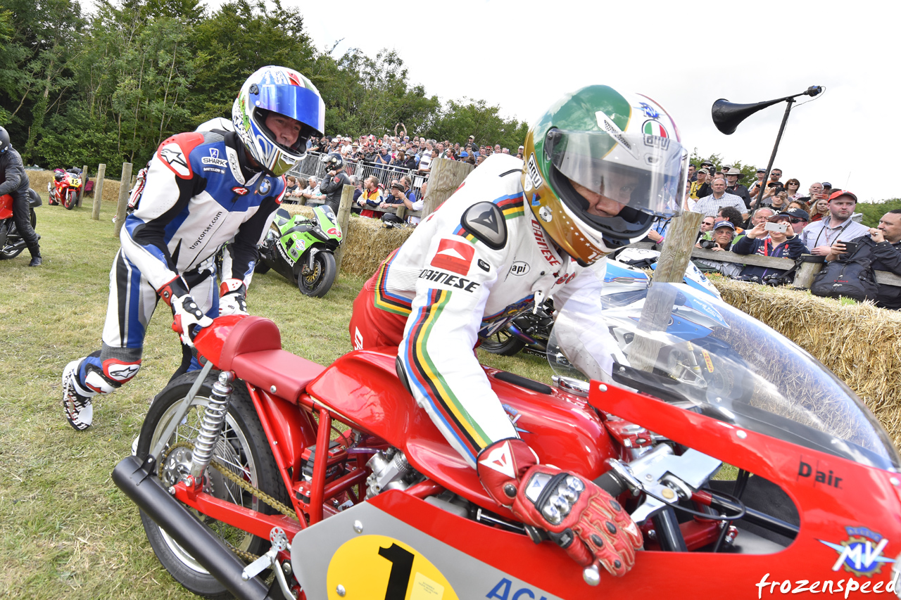 Troy Corser pushing Giacomo Agostini