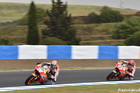 Marc Marquez chasing Dani Pedrosa